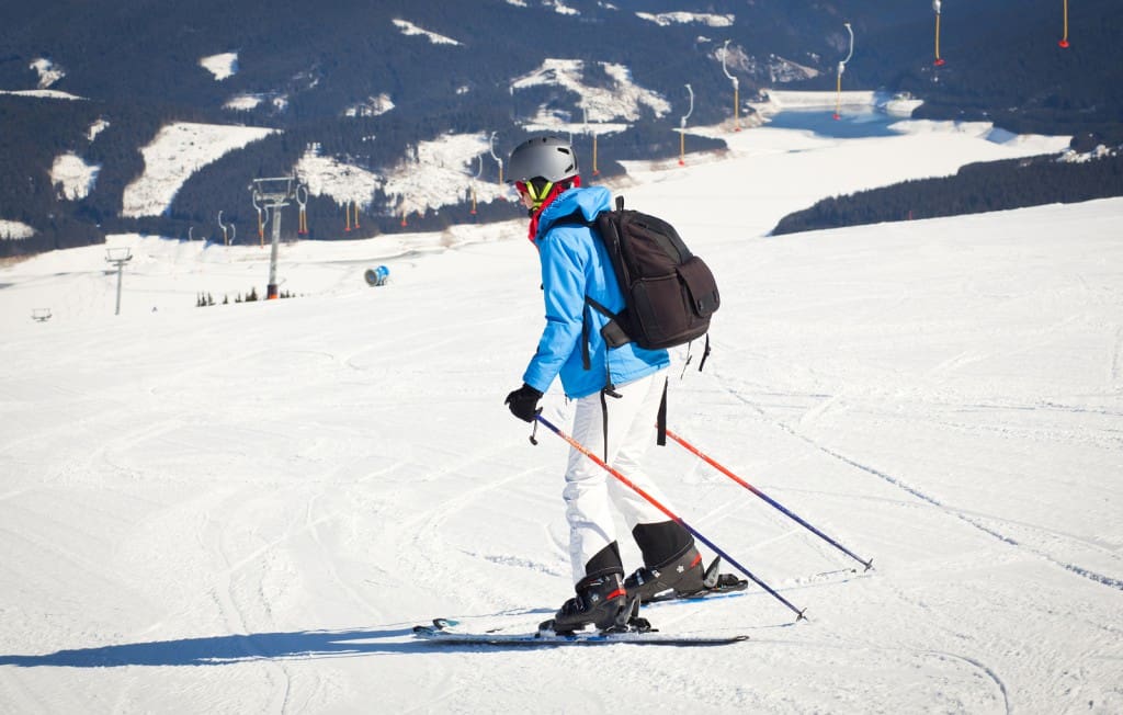 Woman learning how to ski