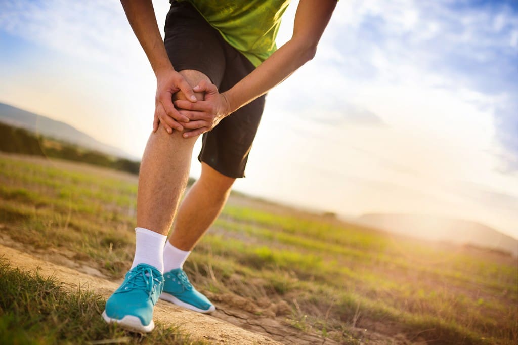 Runner with injured knee