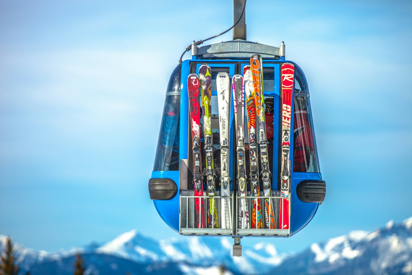 Skis attached to back of chairlift