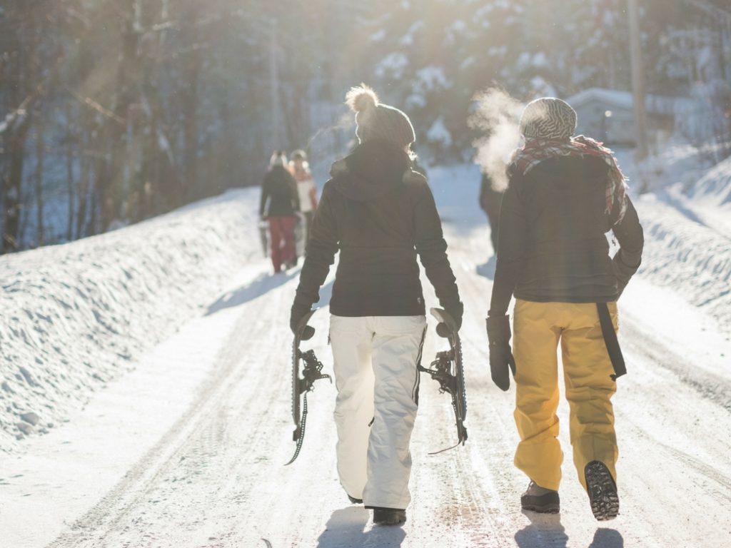 Skiers walking on the snow