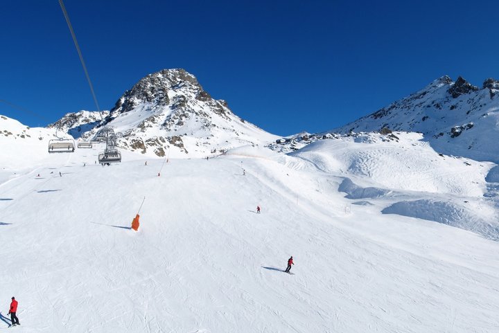 Austrian ski lift above skiers