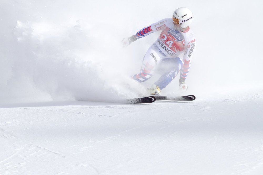 A skier turns sharply on the slopes.
