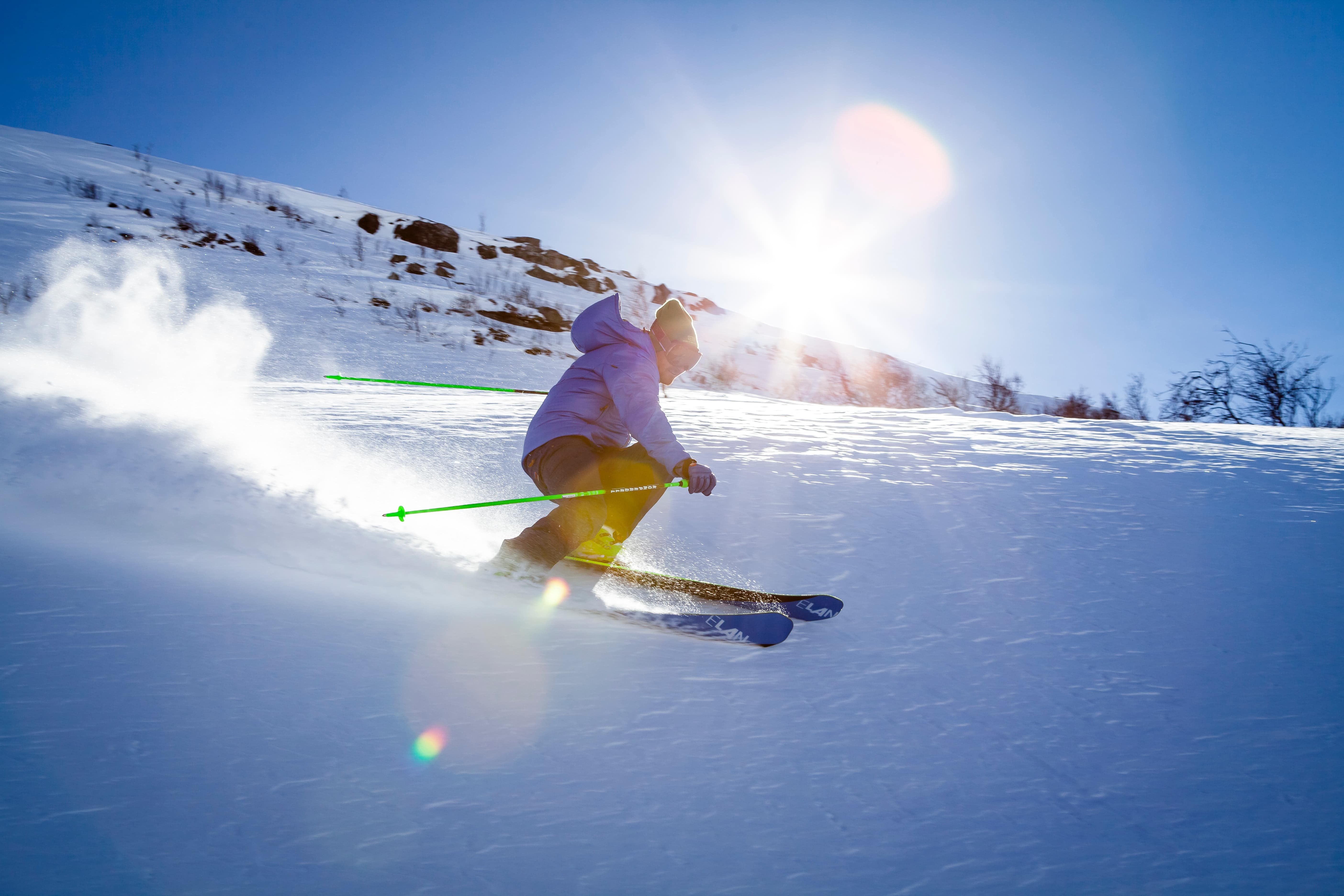 Skiing under blue skies