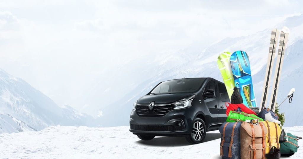 An Alps2Alps ski transfer vehicle in the snow