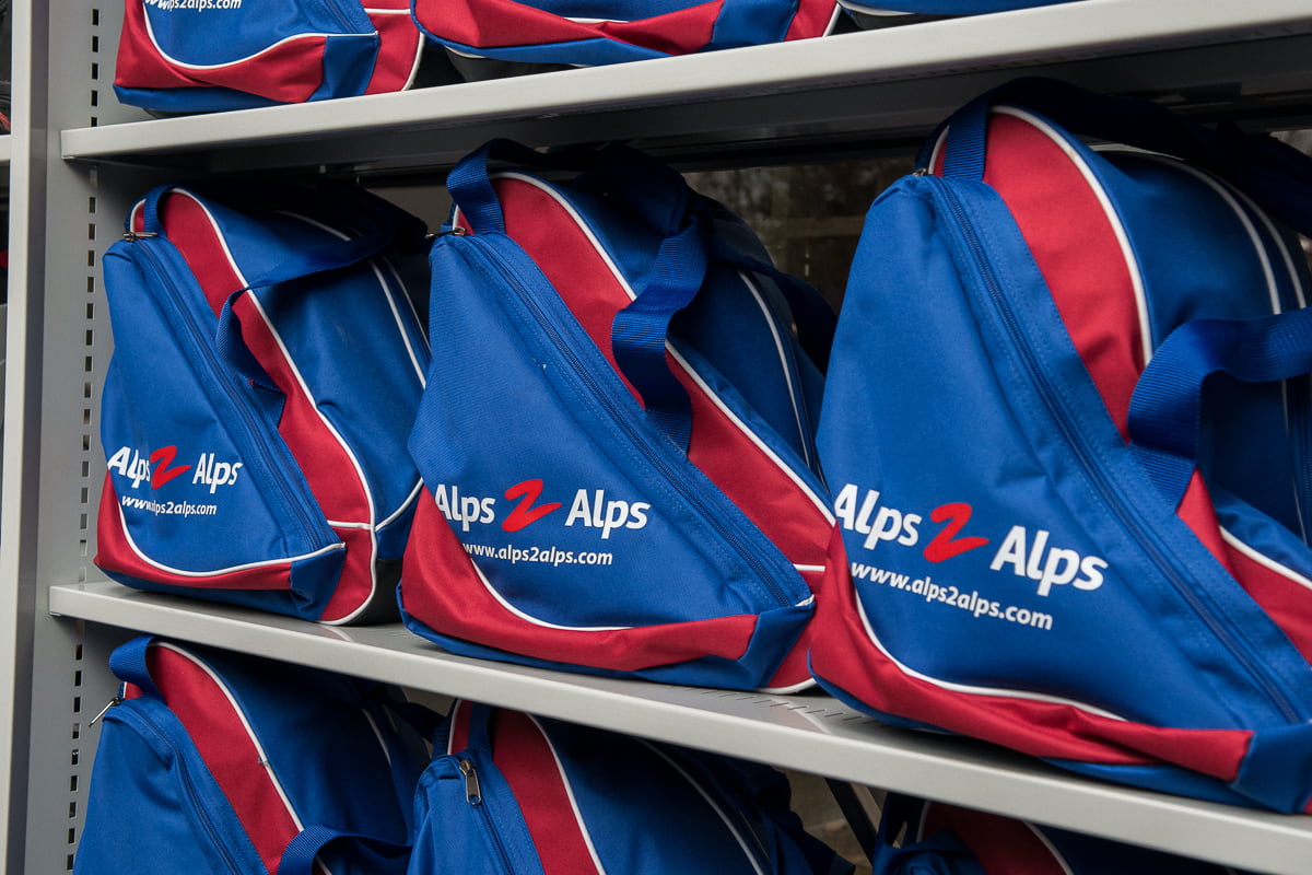 Alps2Alps ski boot bags on a shelf