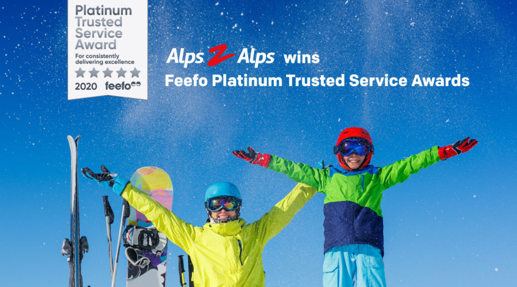 Happy skiers under a blue sky with text and Feefo award logo