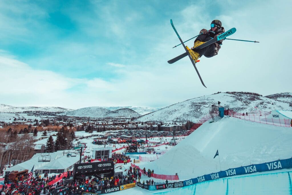 Skier mid jump on the slopes