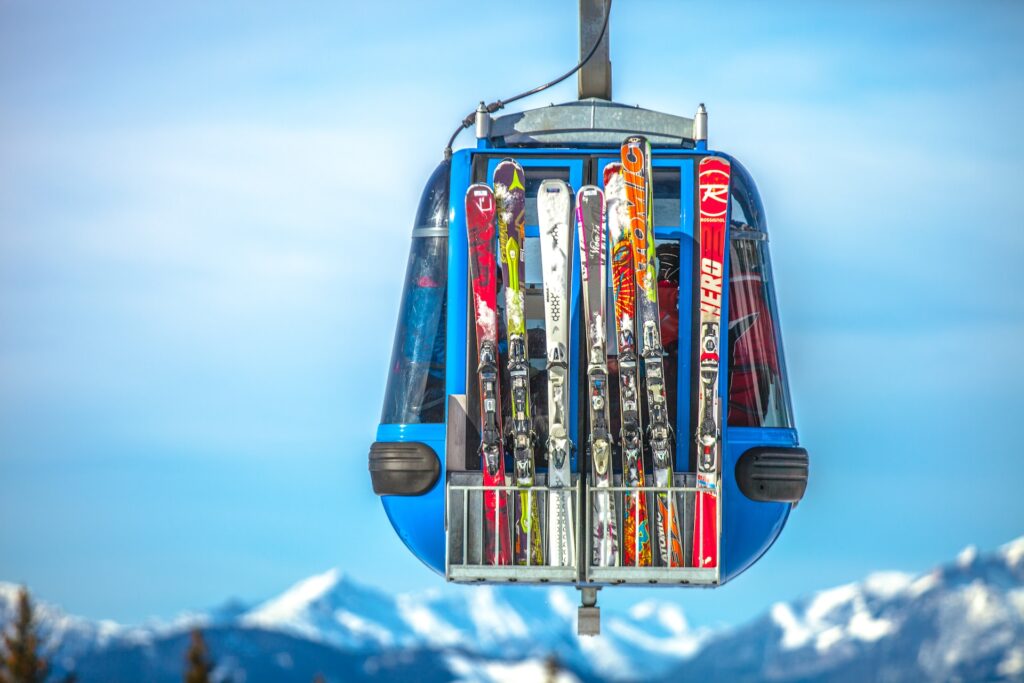 skis loaded onto a cable car