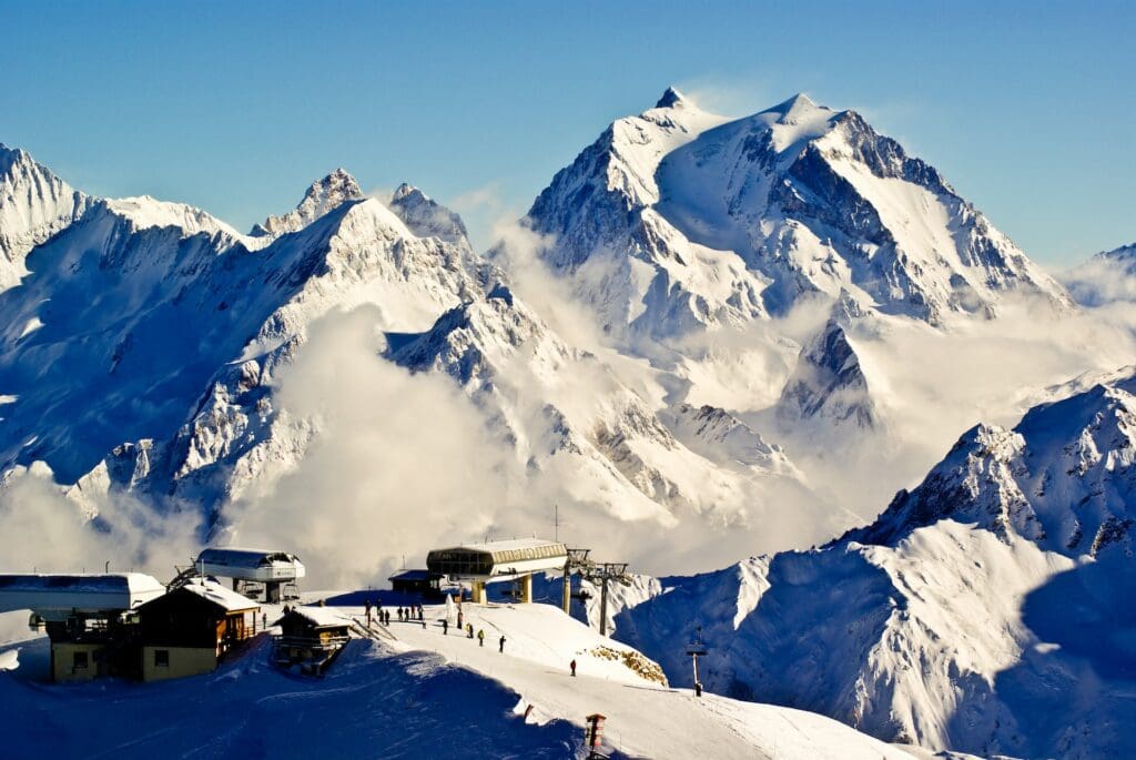 snow covered mountain with ski lift in background - Courchevel