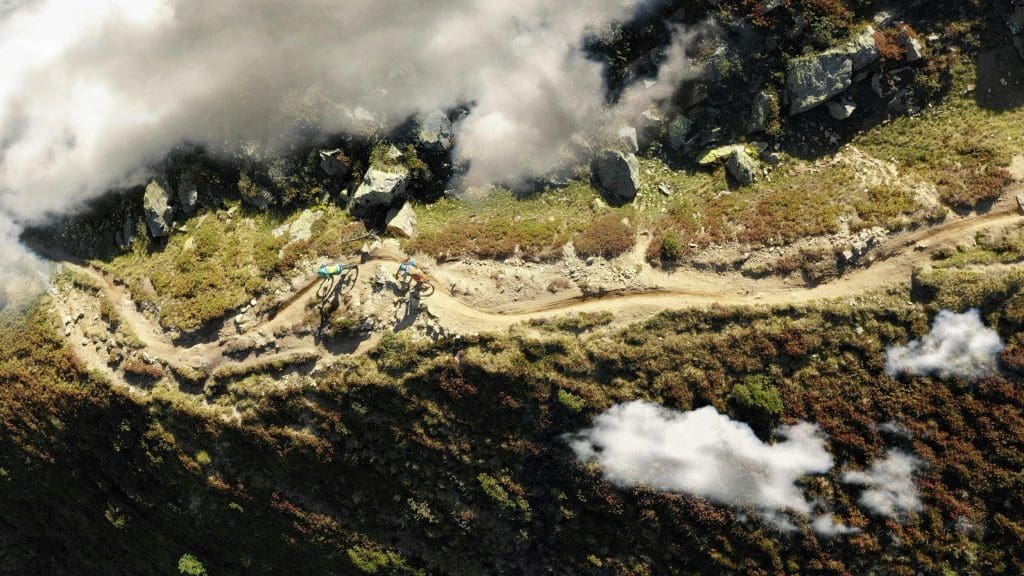 Birdseye view of cyclists in the Alps