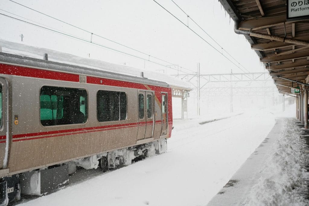 Train transfer in the snowy Alps