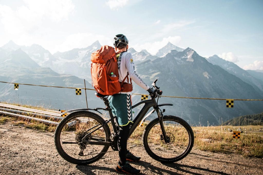 Cyclist road cycling in the Alps